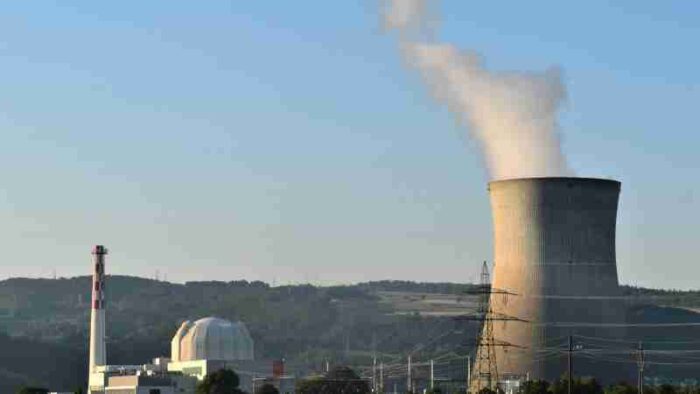 Power plant cooling tower releasing steam near Leibstadt, highlighting industrial energy production., tags: hochuls - pexel